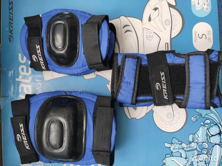 Роликовые коньки