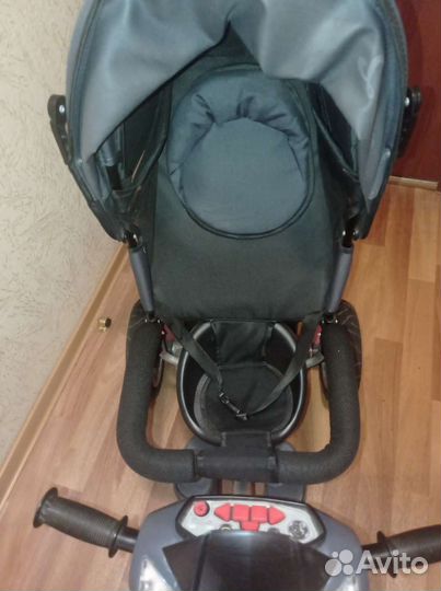 Трехколесный велосипед с ручкой