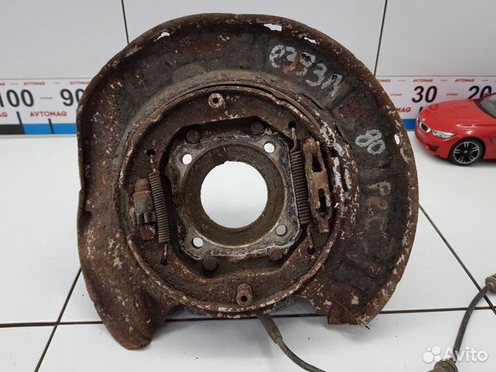 Кулак задний левый (BMW 5)