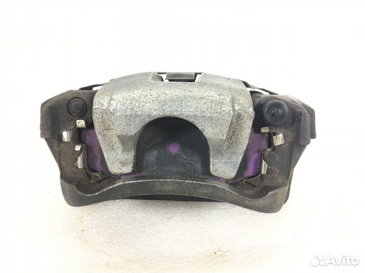 Суппорт тормозной задний левый Lexus Lx570