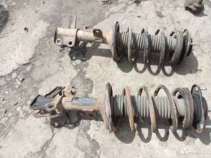 Передняя левая стойка Geely Emgrand EC7