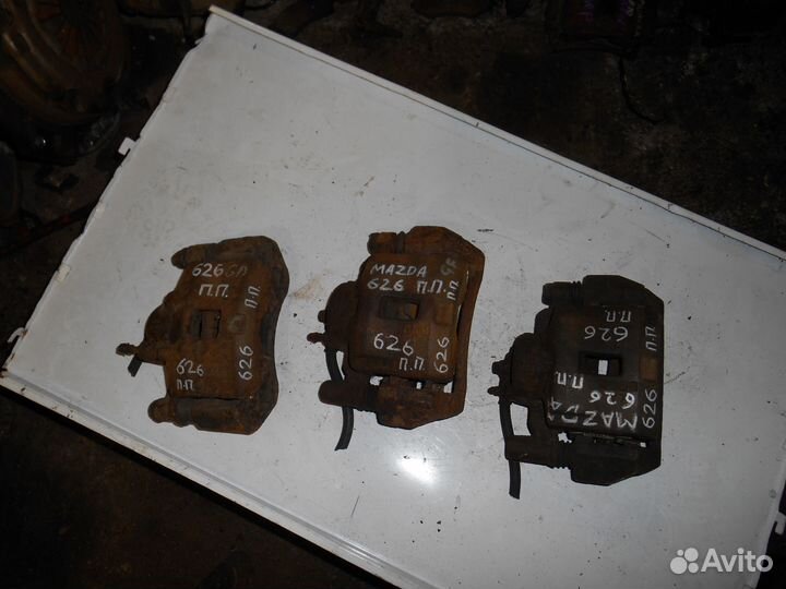 Суппорт передний правый Mazda 626 Мазда 626