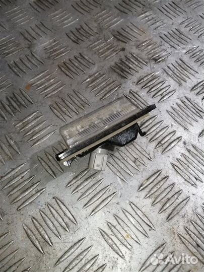 Фонарь подсветки номера задний правый Mitsubishi