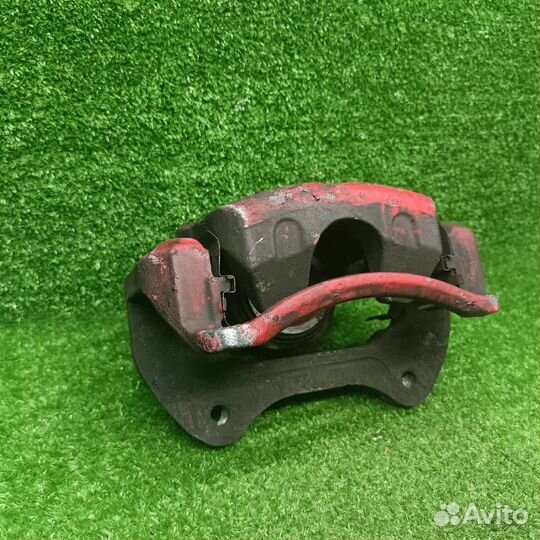 Суппорт тормозной передний правый Opel Astra J GTC