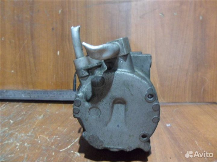 Компрессор кондиционера 926000W701 Nissan Terrano