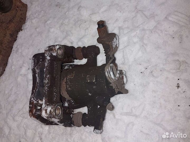 Суппорт тормозной задний Опель Астра Н