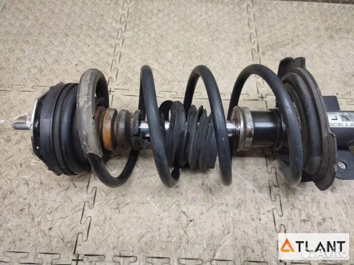 Стойка передняя левая mazda demio