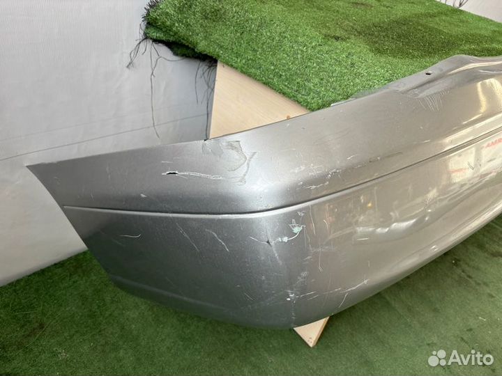 Бампер задний Nissan Sunny B15