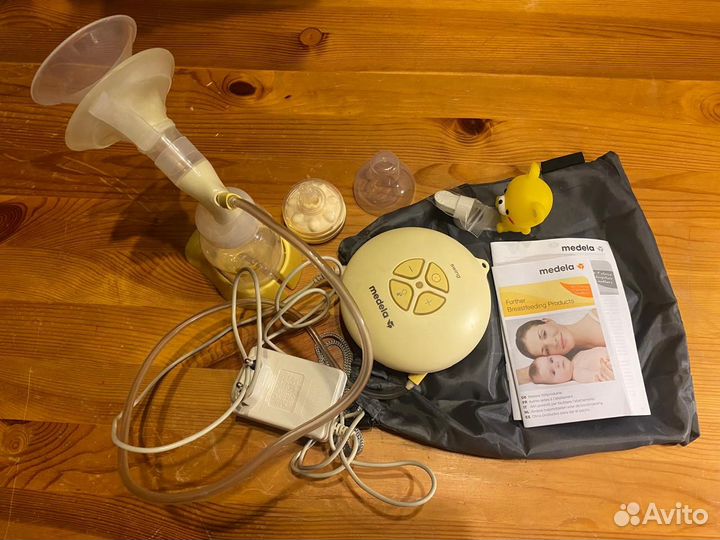 Молокоотсос medela электрический