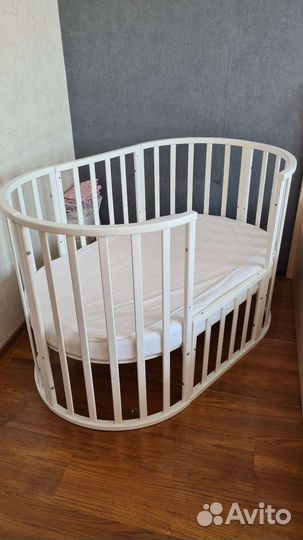 Детская кроватка трансформер с маятником