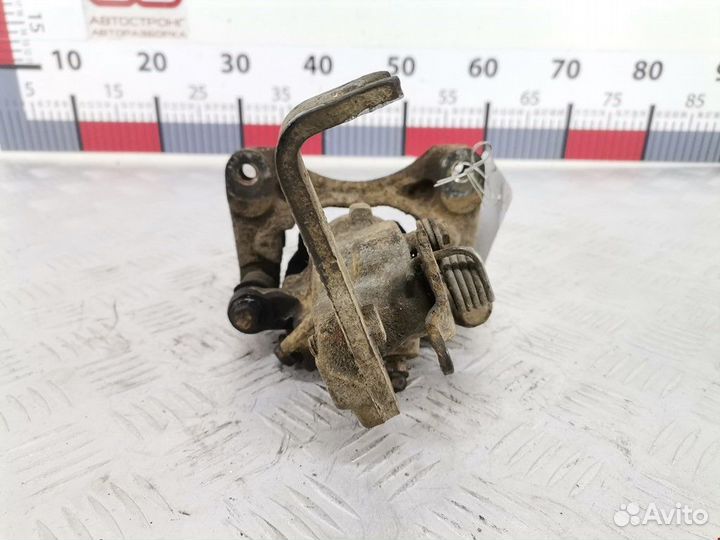 Суппорт задний правый Nissan Almera Tino V10 2000