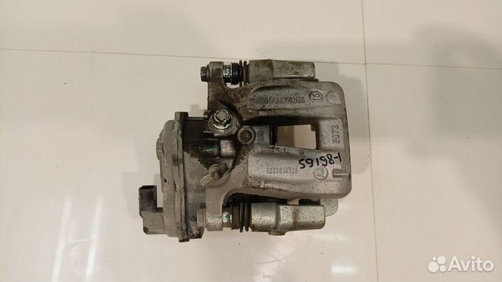 Суппорт задний правый (Chery Tiggo 7 Pro)