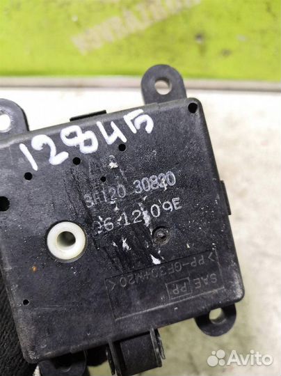 Моторчик заслонки отопителя Ниссан Теана