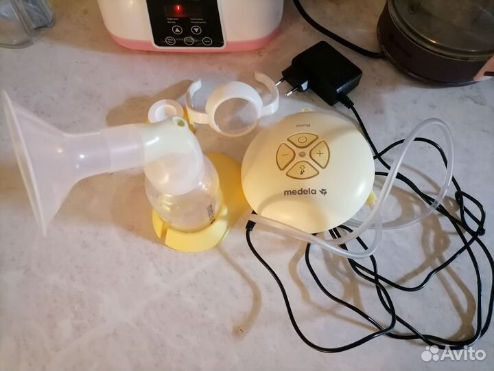 Молокоотсос medela электрический