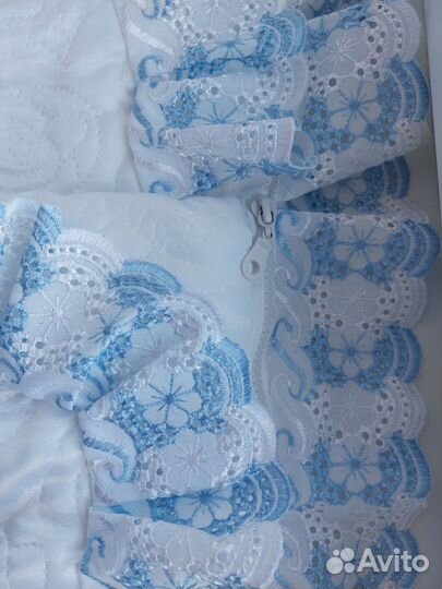 Конверт и вещи для новорожденного