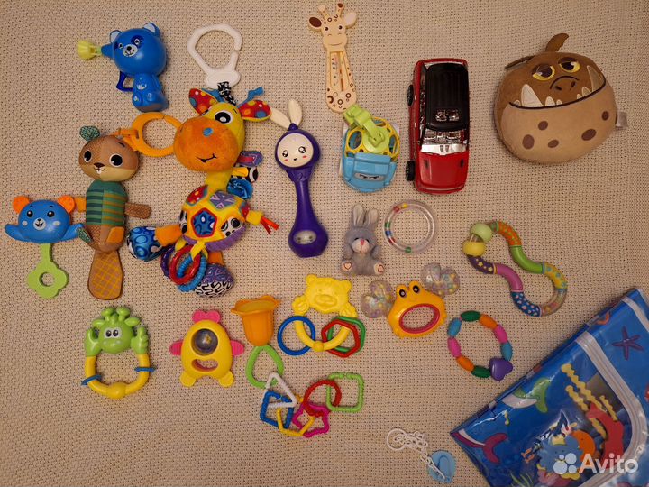 Игрушки погремушки для новорожденных