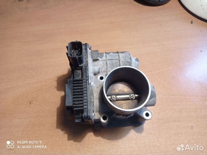 Дроссельная заслонка Nissan Sunny FNB15