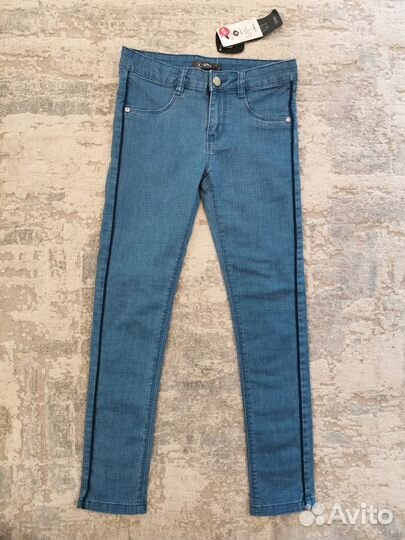 Новые джинсы на 9-12 лет