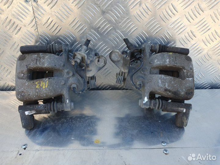 Суппорт задний Volkswagen Touran 2006-2010