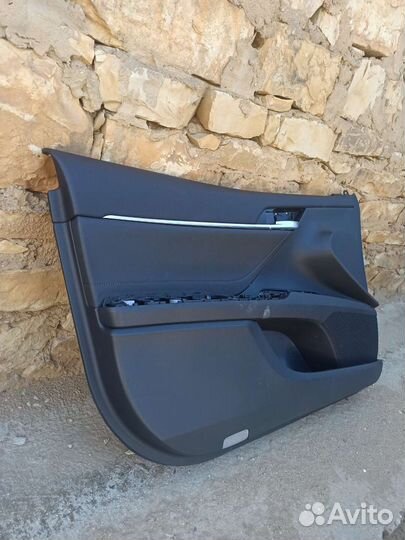 Обшивка двери camry 75