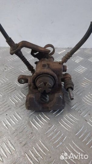 Суппорт тормозной задний левый Honda Civic хэтчбэк