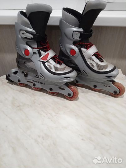 Роликовые коньки