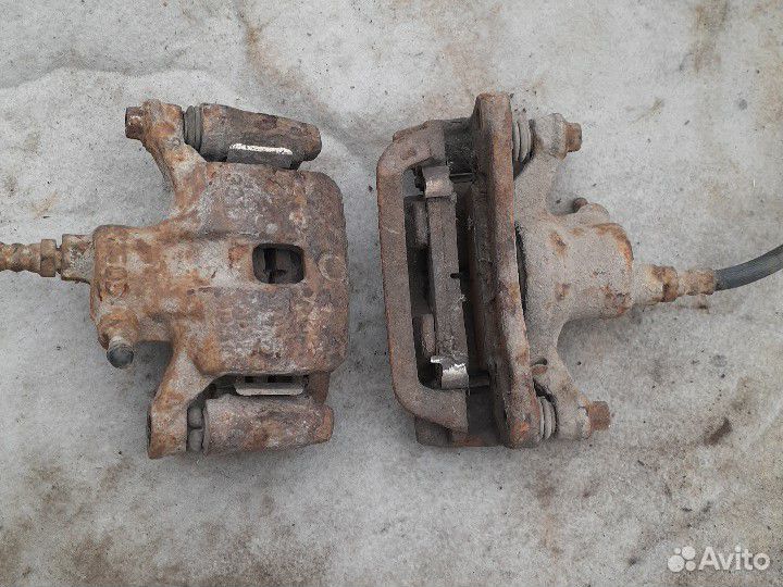 Суппорт тормозной Mitsubishi Galant 7