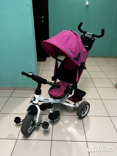 Трехколесный велосипед с ручкой