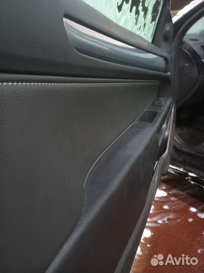 Обшивка двери передняя левая Opel Astra H GTC