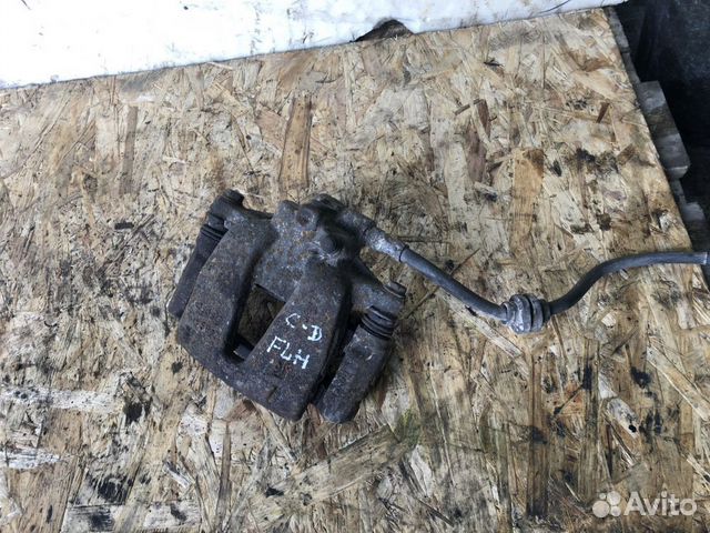 Суппорт передний левый opel corsa D