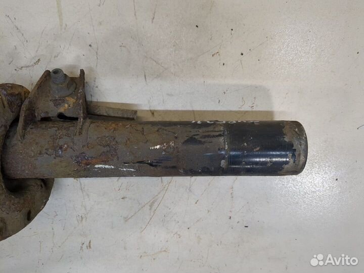 Амортизатор подвески левый передний Volkswagen Passat 7 Европа, 2012