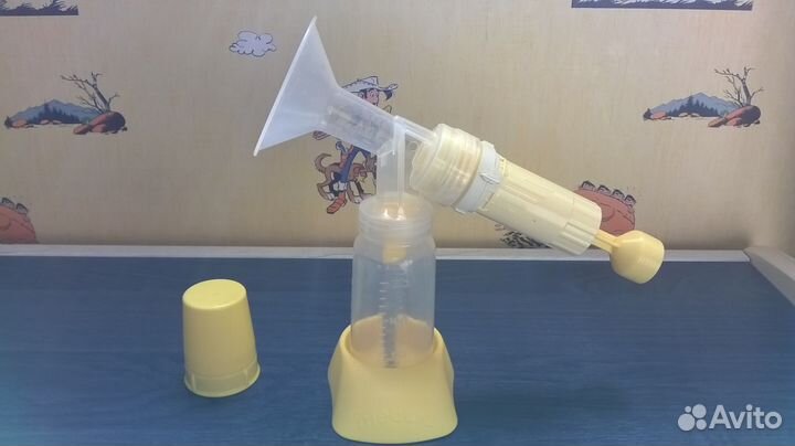 Удобный Молокоотсос Швейцария