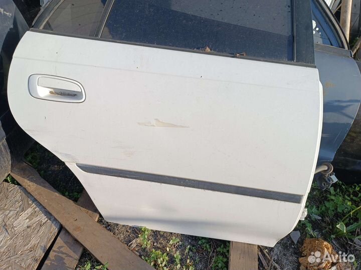 Дверь Toyota carina t190