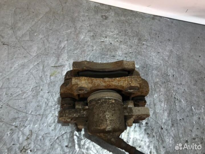 Суппорт тормозной передний левый LADA Гранта