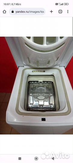 Стиральная машина с вертикальной загрузкой