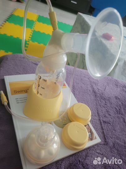 Молокоотсос medela электрический