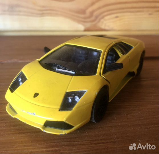 Коллекционные машинки Kinsmart