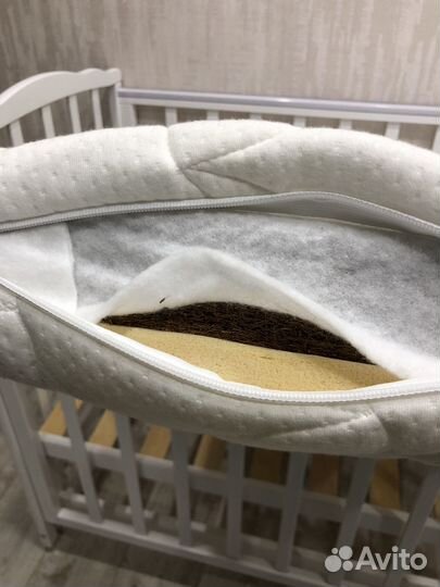 Детская кроватка с продольным маятником