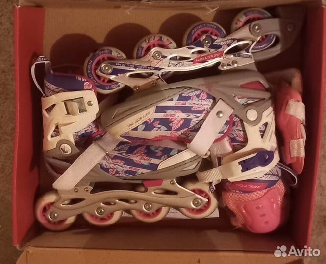 Роликовые коньки