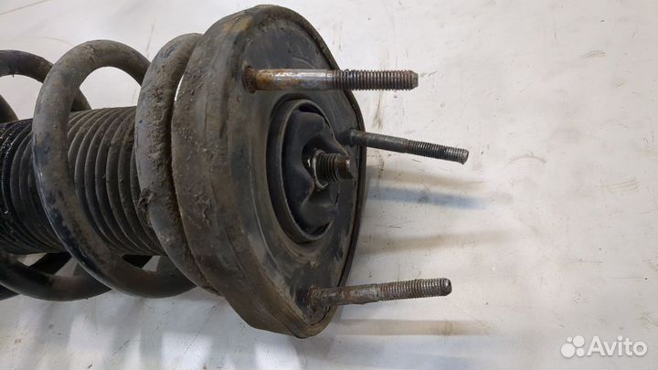 Амортизатор подвески левый задний Subaru Forester (S11)