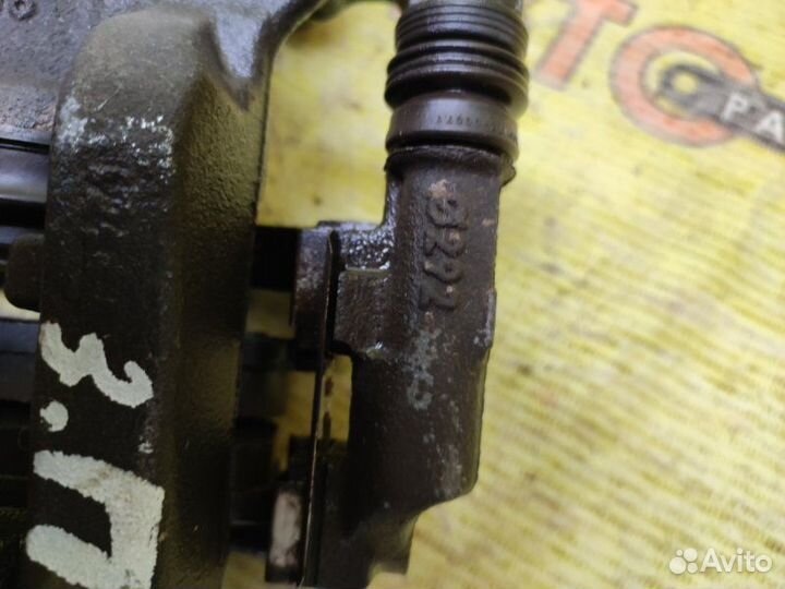 Суппорт задний правый Opel Astra J A16LET 2013