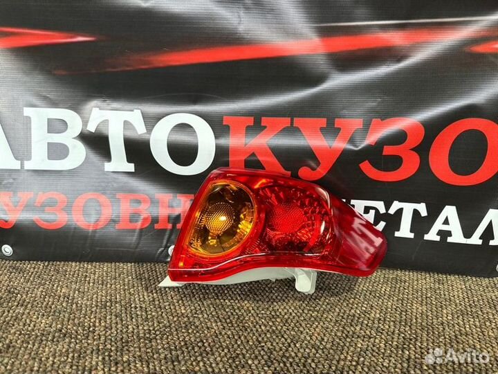 Фонарь правый Toyota Corolla 150 SDN 2007