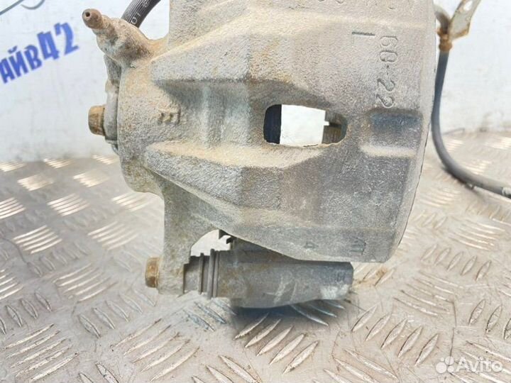 Суппорт тормозной передний левый Toyota Corolla