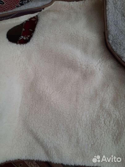 Меховая жилетка