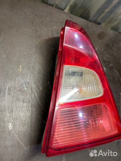 Фонарь заднего хода задний правый Renault Logan