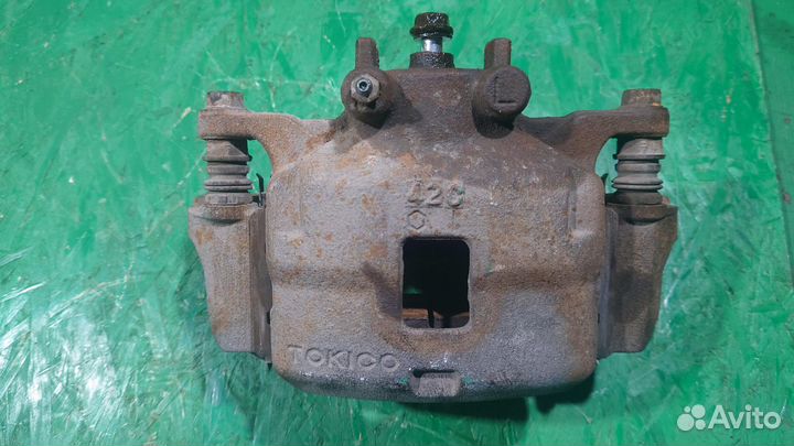 Суппорт передний L L200/4 mitsubishi L200 (2006-20