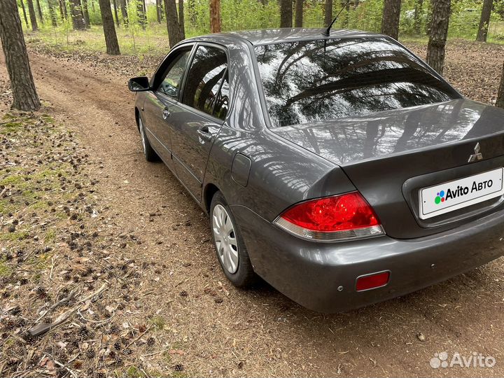 Mitsubishi Lancer 1.6 МТ, 2006, 167 000 км