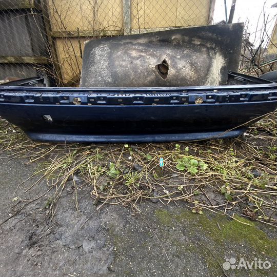 Задний бампер е38