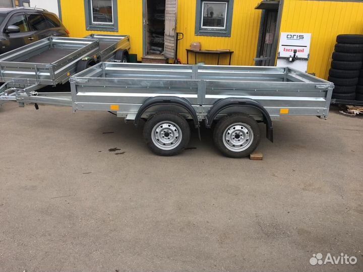 Легковой двухосный прицеп