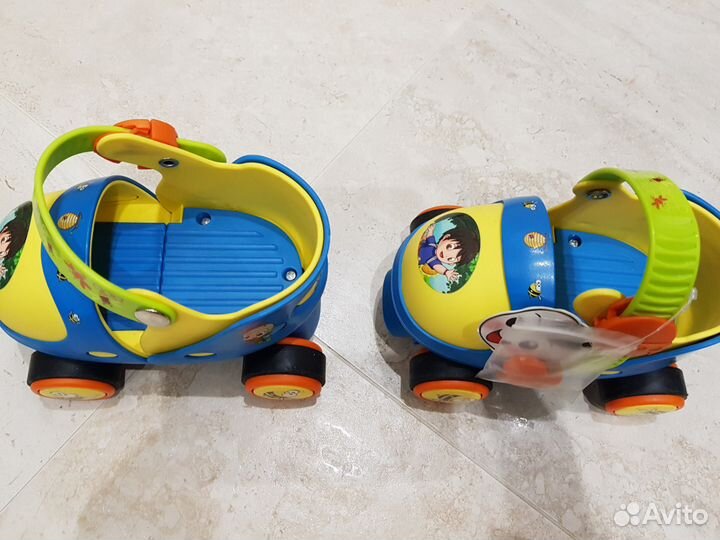 Роликовые коньки новые + защита